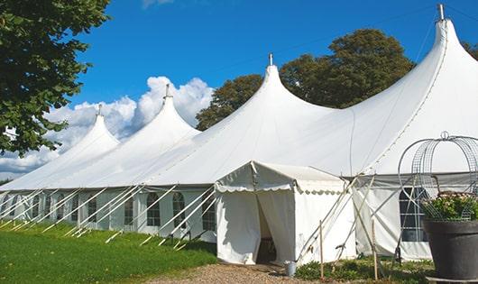 a line of sleek and modern portable restrooms ready for use at an upscale corporate event in Beaver Falls, PA